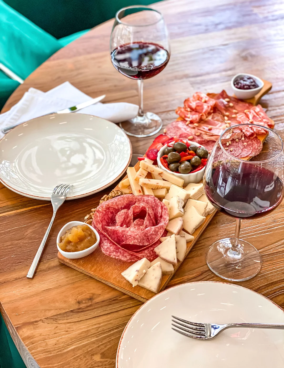 Mystic Restaurant table with wine and shared plates